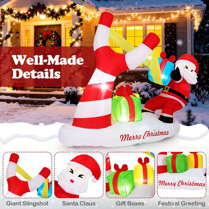 Inflatable Christmas Santa slingshot decoration with gift boxes and LED lights