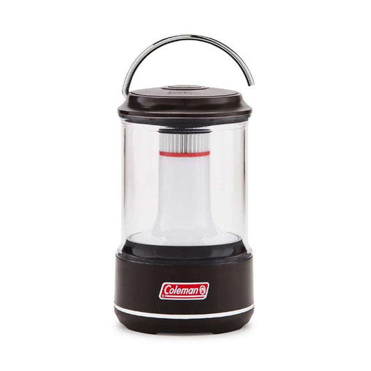 Coleman mini LED lantern with clear body and black base, top handle