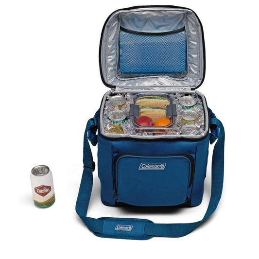 Deep ocean blue soft cooler open with insulated interior, mesh top pocket, and shoulder straps