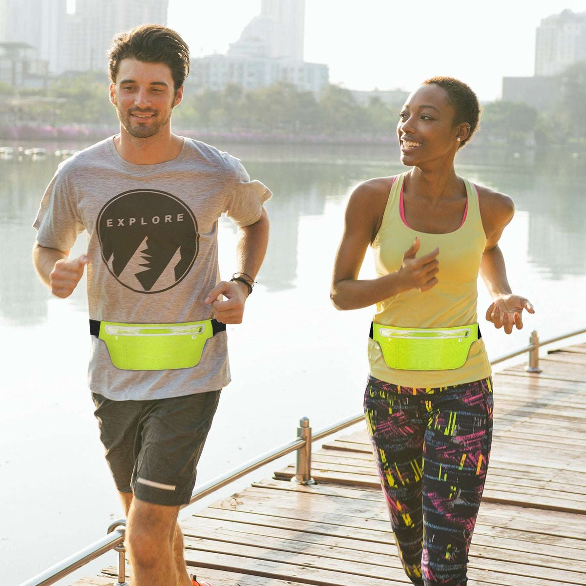Neon green waist pack worn while running, with black adjustable strap and zip pocket