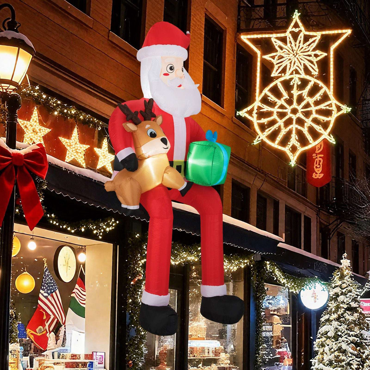 9.5-foot inflatable Santa holding a reindeer and gift, with built-in LED lights