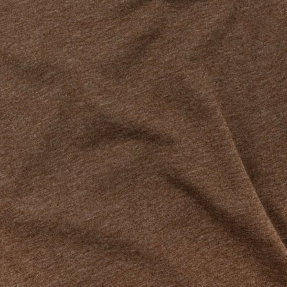 Brown T-shirt fabric texture close-up with fine knit pattern
