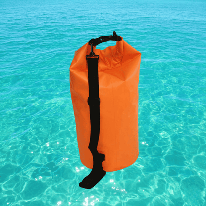 High-visibility orange waterproof dry bag with roll-top and black shoulder strap, upright