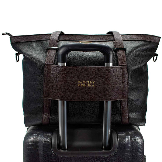 Black vegan leather weekender duffel bag with carry handle and logo front plaque