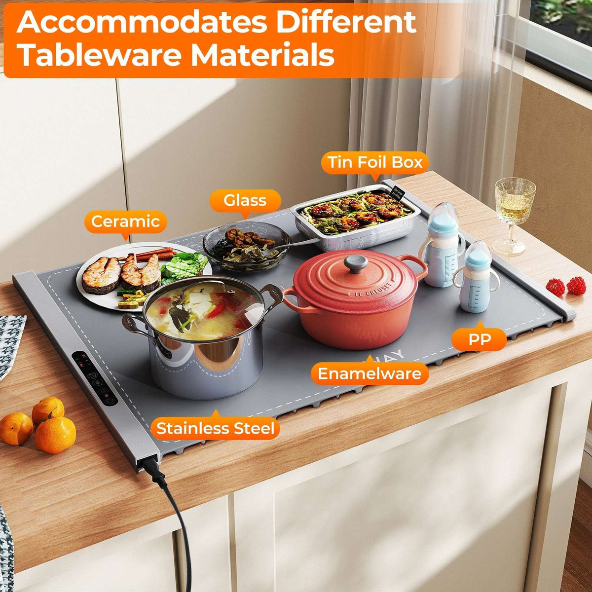Gray electric food warming mat displaying compatibility with ceramic, glass, and metal cookware
