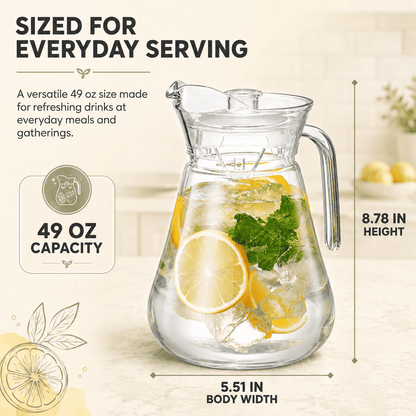 Clear acrylic pitcher with lid, filled with lemon slices, mint leaves, and ice.