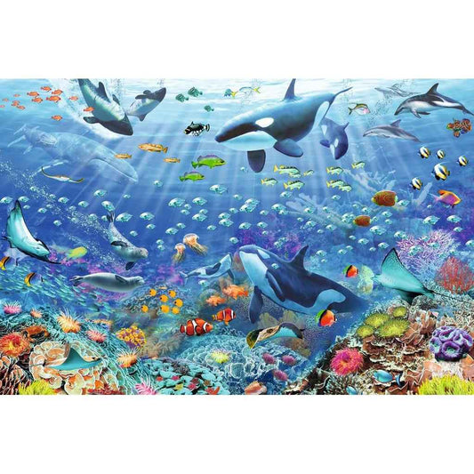 Underwater ocean jigsaw puzzle artwork with dolphins, coral reef, and bright fish