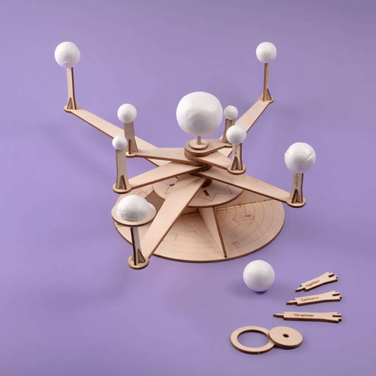 Wooden solar system model kit with white foam planet spheres and assembly arms