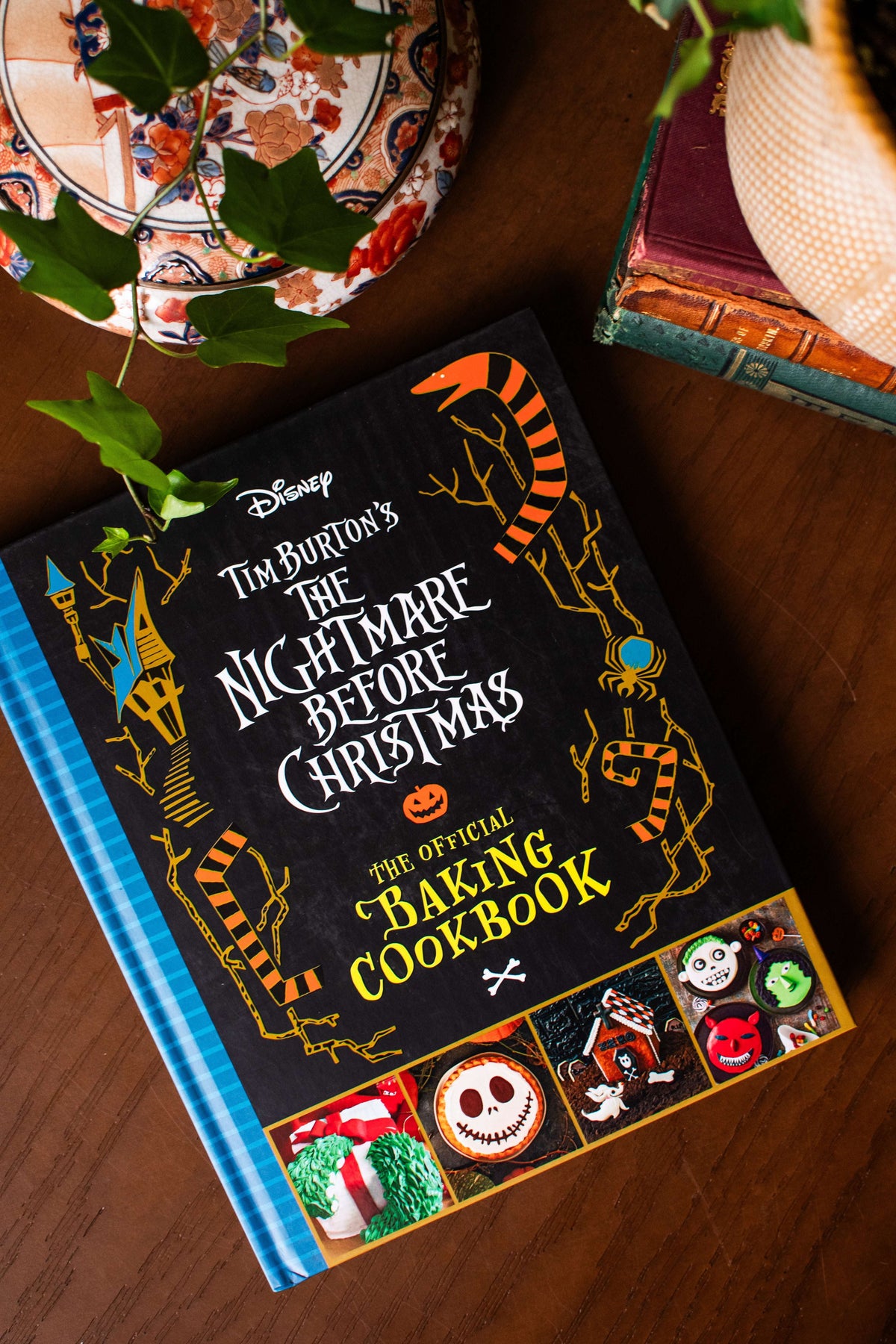 Baking cookbook with illustrated black cover and blue striped spine