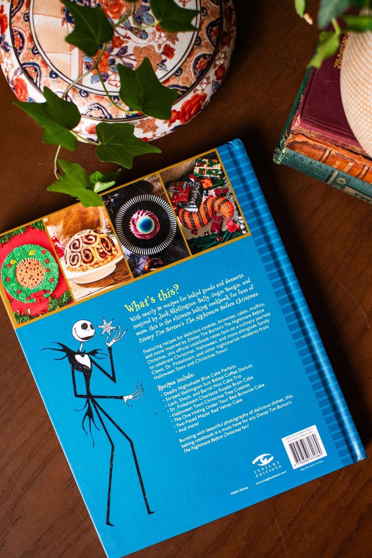 Baking cookbook back cover with blue design, dessert photos, and barcode