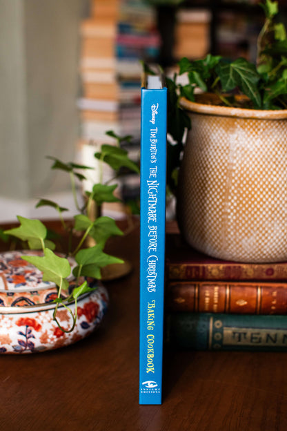 Baking cookbook shown spine-on, with blue spine and white and yellow lettering