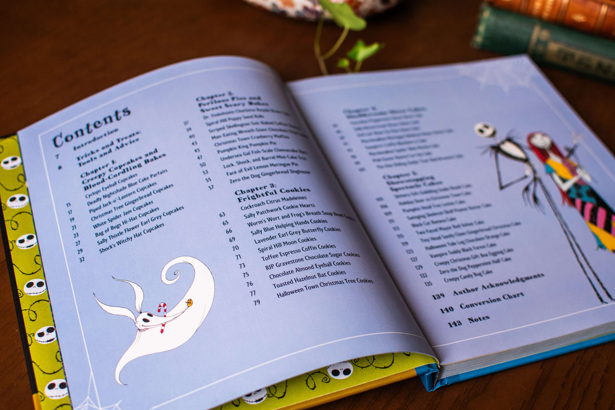 Open cookbook displaying the contents pages and character illustrations