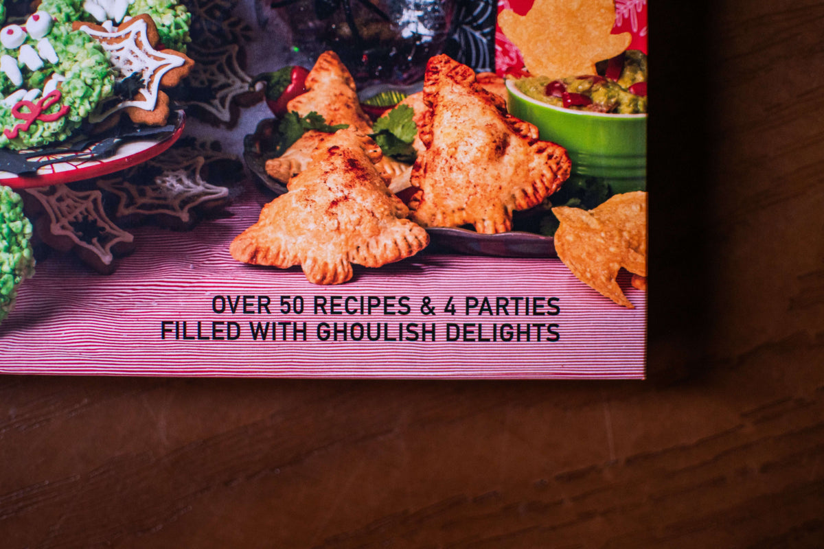 Cookbook cover detail showing savory pastries and the printed recipe count
