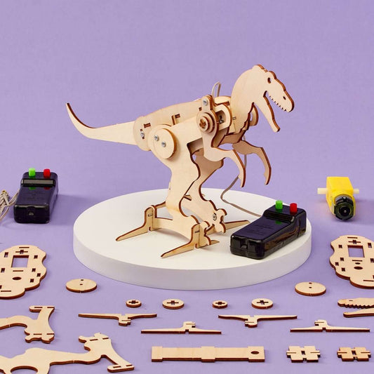 Assembled T-Rex robot model with wooden pieces and two black battery modules