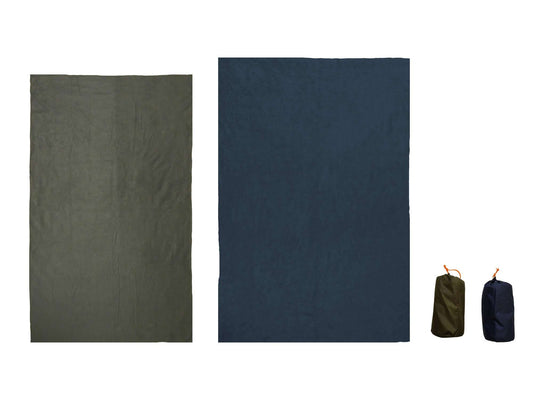 Fleece camping blanket folds with storage pouch, shown in dark green and navy