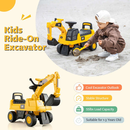 Yellow kids ride-on excavator toy with black tracks and bucket, outdoors with child