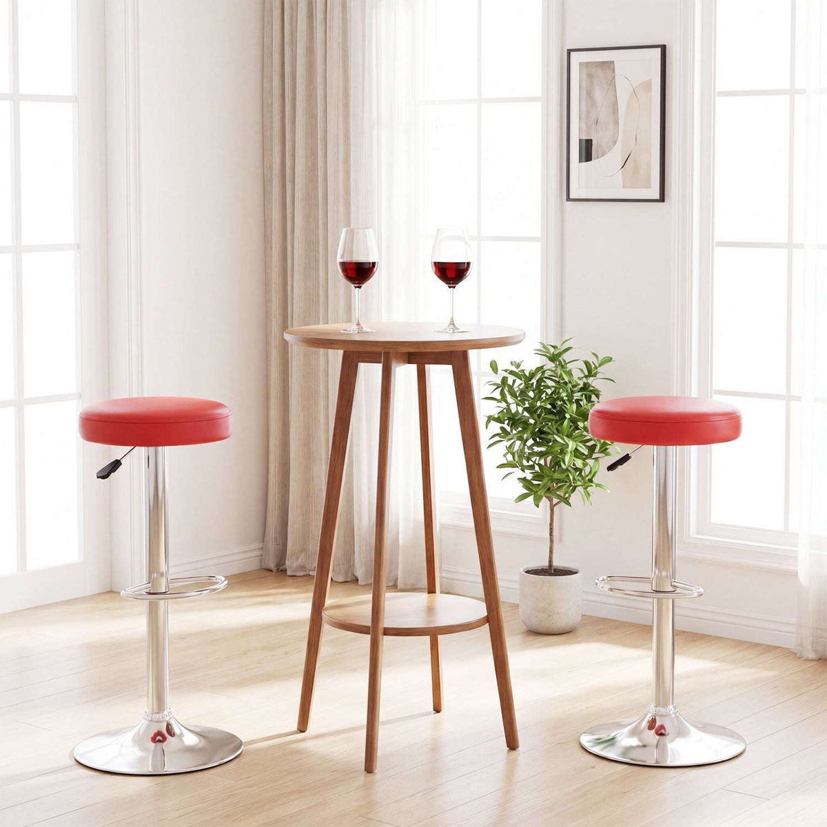 Two red adjustable swivel bar stools with chrome bases and footrests