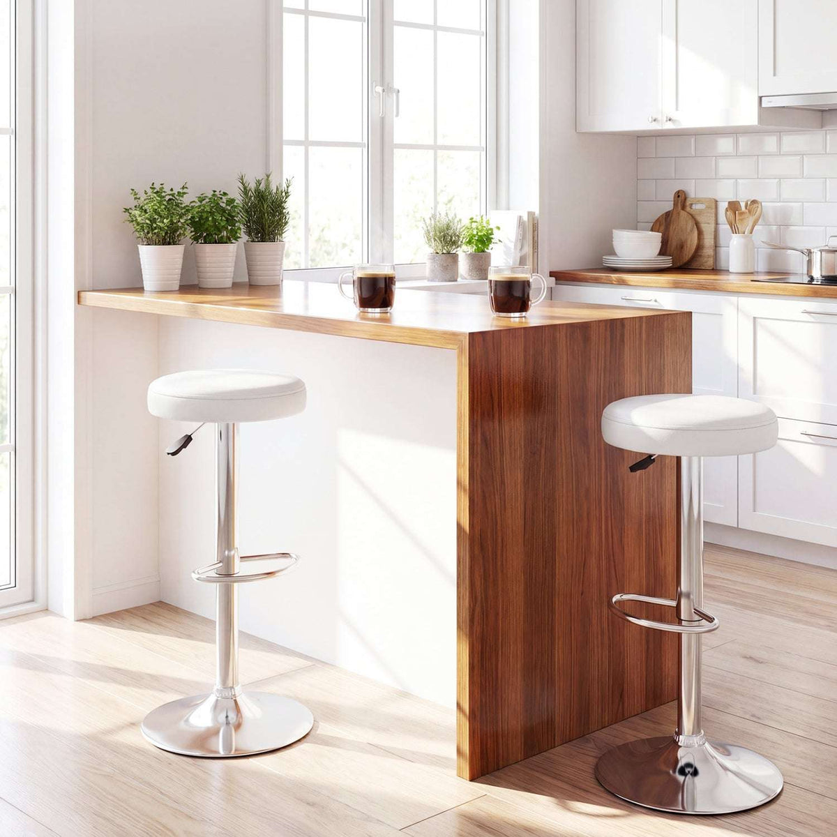 Two white adjustable bar stools with chrome bases and footrests