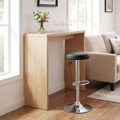 Black adjustable swivel bar stool with padded seat, chrome pedestal, footrest and round base