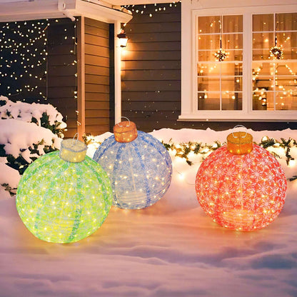 Set of three pre-lit pop-up Christmas ball ornaments in green, blue, and red