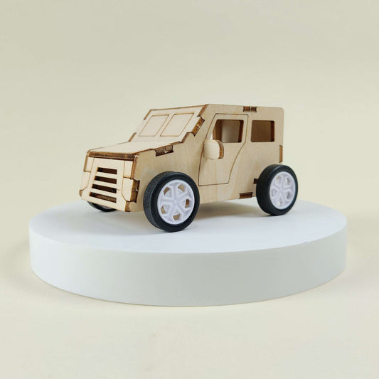 Wooden pull-string DIY toy car with white wheels and open front grille, side view