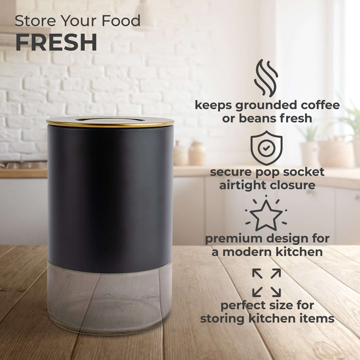 Black round storage container with stainless lid and clear glass base for coffee or beans