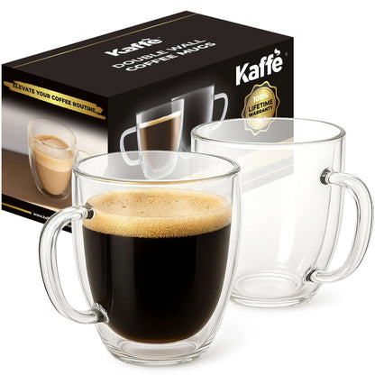 Clear glass coffee mugs with handles, one filled with dark coffee and foam