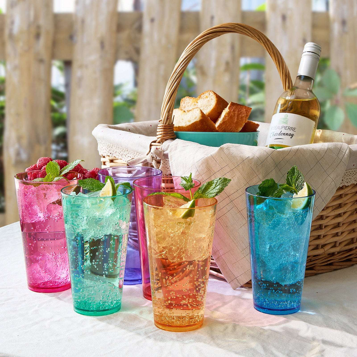 Set of 6 Madrid acrylic highball glasses in assorted colors with ice and mint