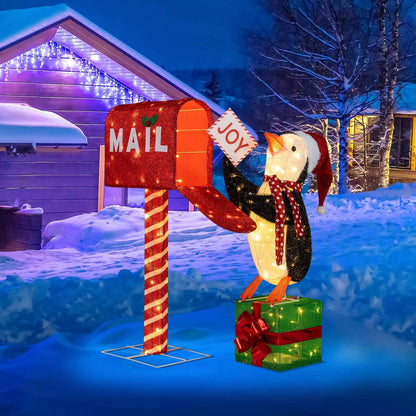 Lighted Christmas mailbox and penguin decoration with penguin holding a JOY sign