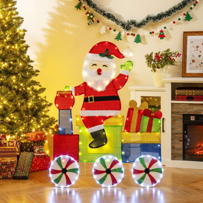 Lighted Santa train decoration with colorful cars, gift boxes and illuminated peppermint wheels
