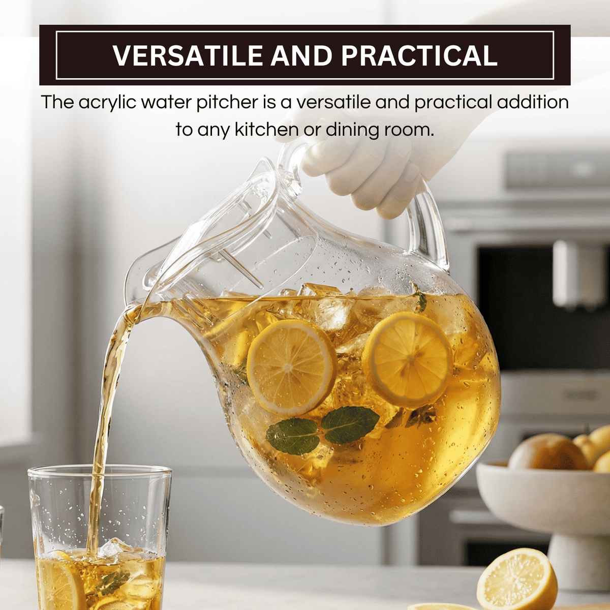 Acrylic pitcher with lid and spout, hand pouring amber lemon drink into a glass