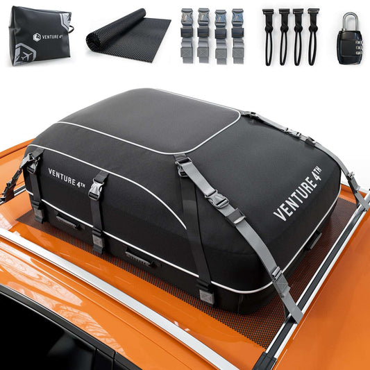 Black rooftop cargo carrier bag with zip and tie-down straps, waterproof design