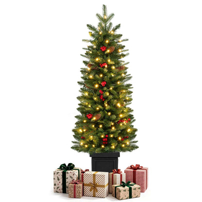 Pre-lit potted Christmas tree with warm white lights, shown with gift boxes