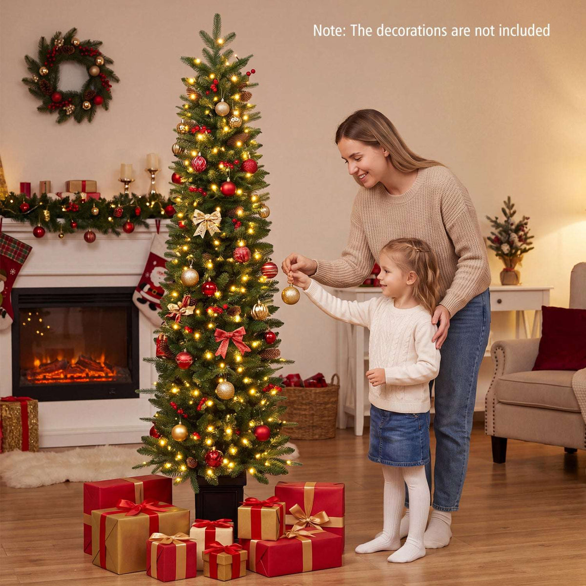 Pre-lit potted Christmas tree with warm white lights, shown beside a family