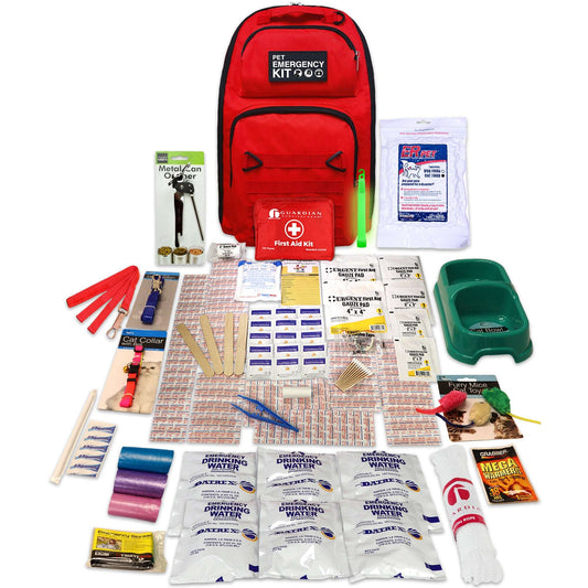 Red emergency cat survival kit backpack with assorted supplies laid out