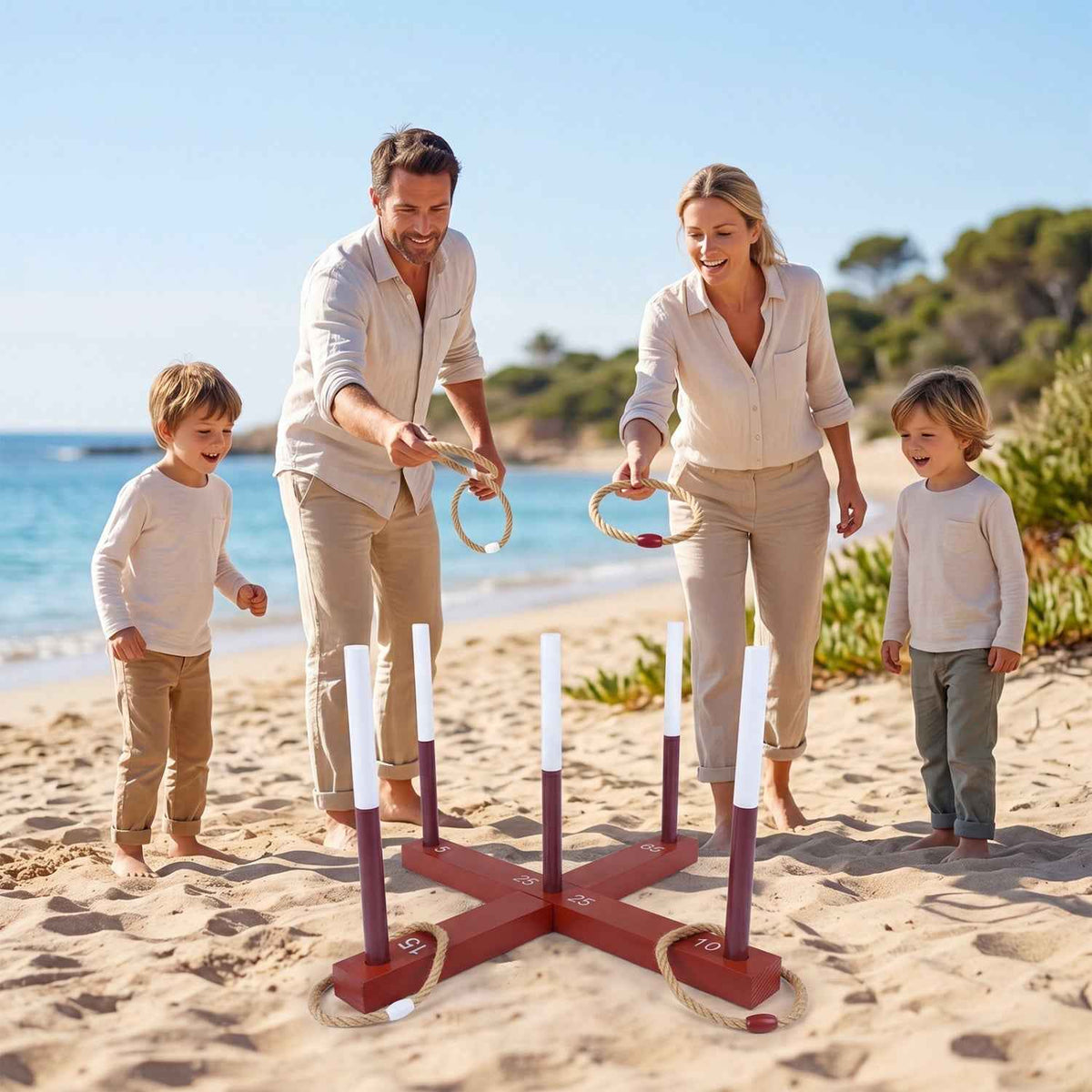 Ring toss game set with burgundy stand and white poles with rope rings