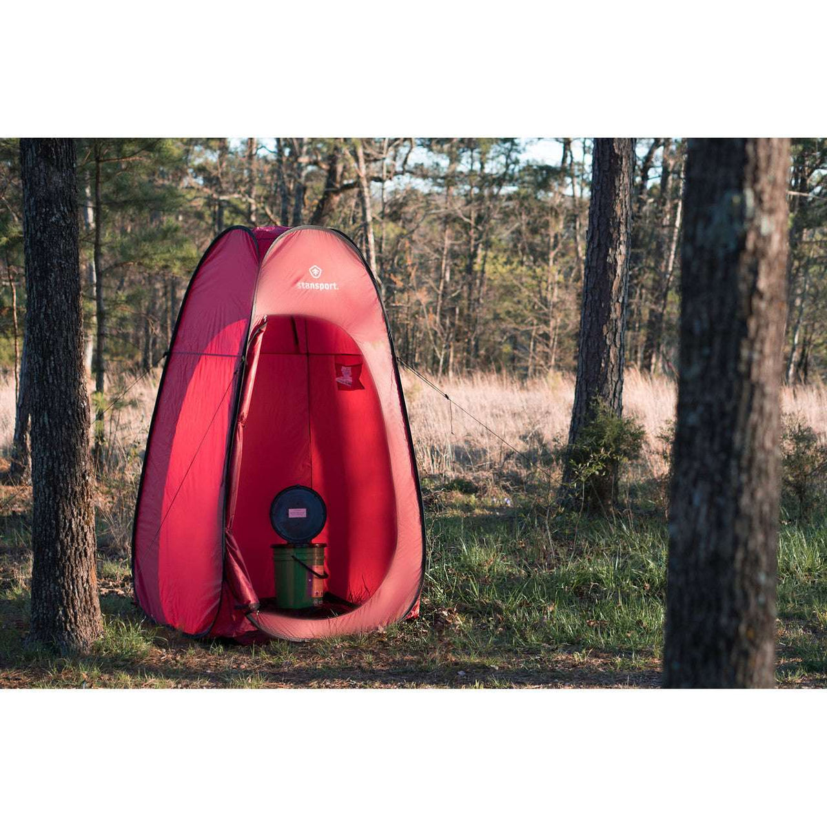 Red pop-up shower privacy tent with open entrance and interior privacy panels