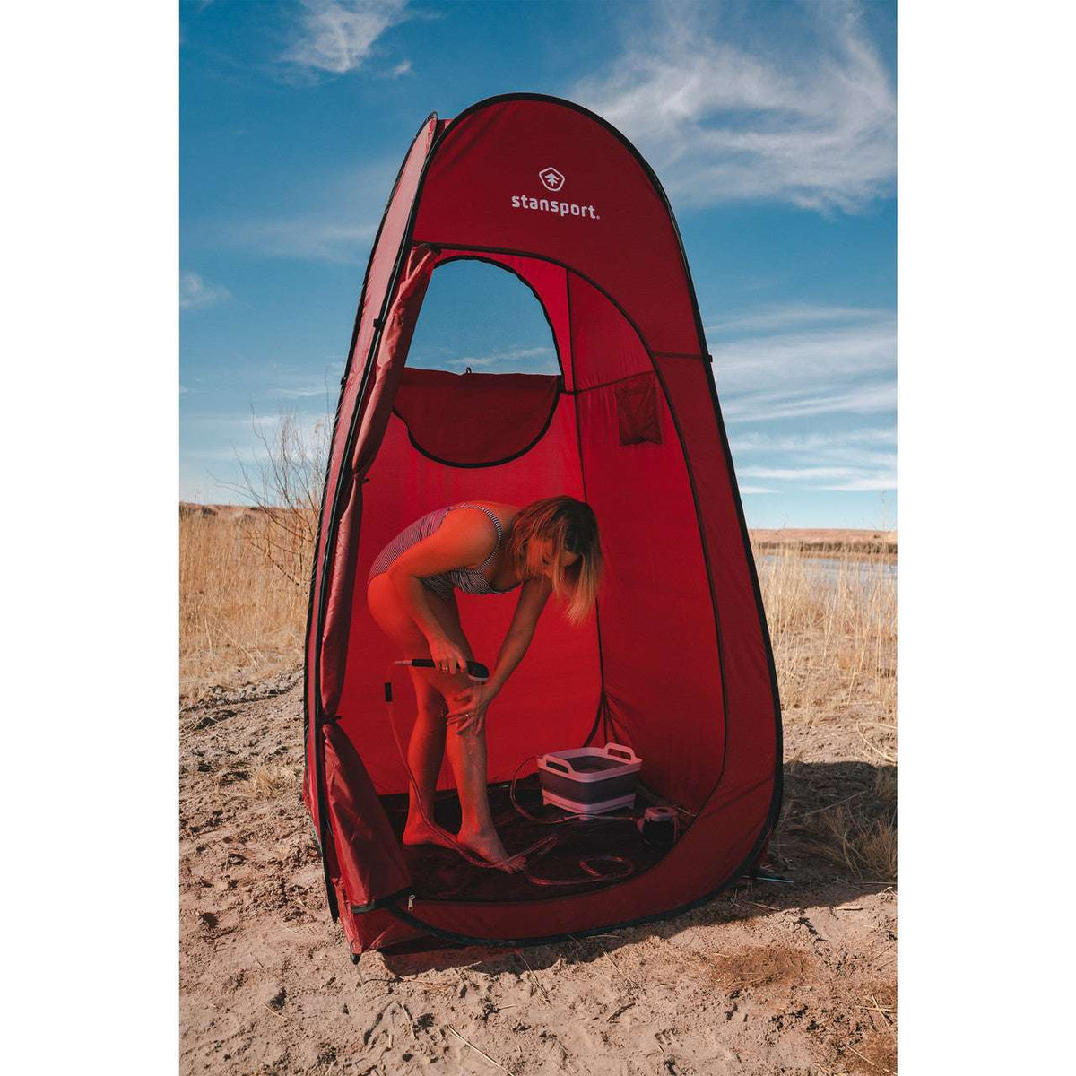 Red pop-up shower privacy tent with open front door and front access panel