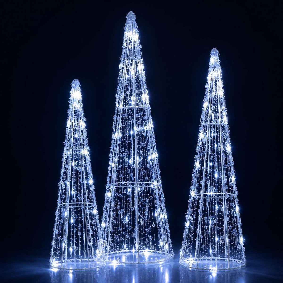 Set of three cone-shaped Christmas trees with cold white LED lights