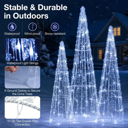 Three outdoor LED cone trees with cold white lights and ground stakes
