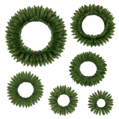 Six green artificial Christmas wreaths in graduated sizes
