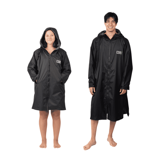 Black hooded waterproof swim parka with front zipper and side pockets