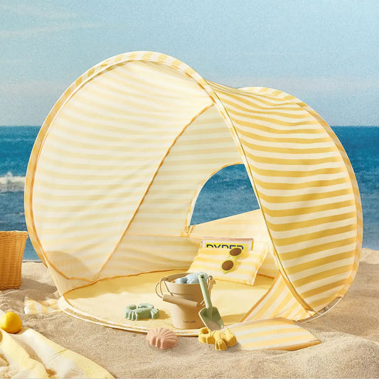 Kids beach play tent with pastel yellow striped fabric and open front window