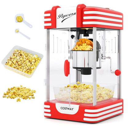 Red and stainless steel popcorn maker with clear cabinet, kettle, and serving tray