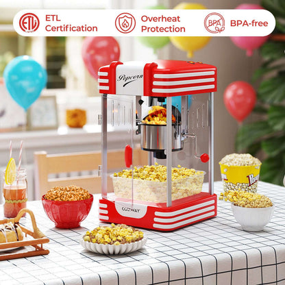 Red popcorn maker with clear cabinet, stainless steel kettle, and two control knobs