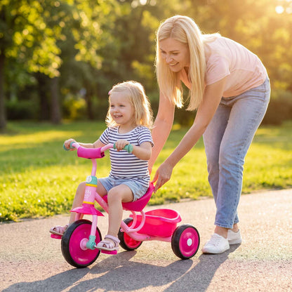 Pink toddler tricycle with storage basket, ridden outdoors on three wheels