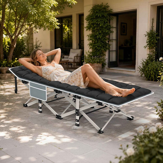 Folding camping cot bed with black soft padded mattress and metal frame