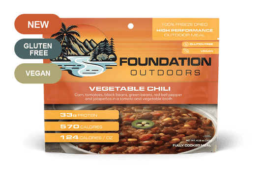 Foundation Outdoors vegetable chili vegan meal pouch, orange label with chili icons