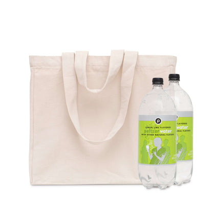Light beige canvas tote bag with long handles and wide flat base