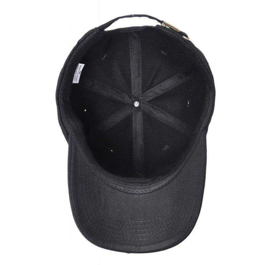 Black cotton 6-panel dad hat, back view with adjustable strap hardware visible.